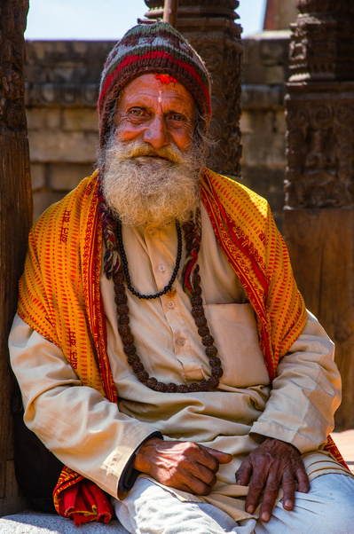 A happy smiling sadhu, holy man, in his traditional clothing in Bhaktapur, Nepal