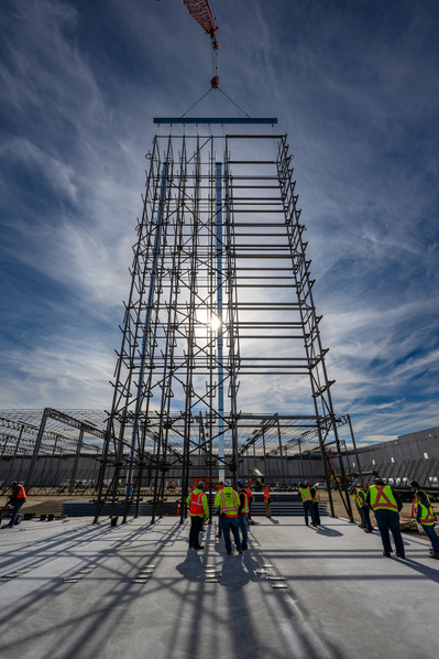 Large industrial shelving component being installed at a KraftHeinz distribution facility