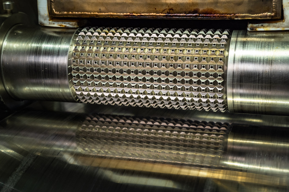 Close up view of a plastic extrusion machine part