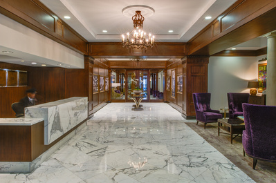 A symmetrical view of the luxurious lobby at 850 Lake Shore Drive in downtown Chicago, IL