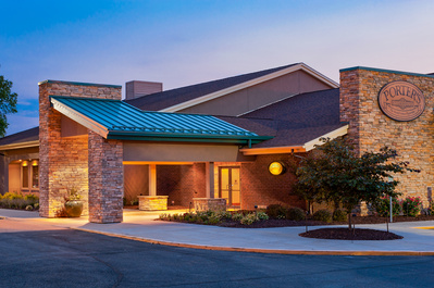 DoubleTree hotel's Porter's Steakhouse restaurant at dusk in Collinsville, IL 