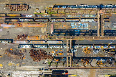 Rail road cars, scrap metals and finished steel products at a modern steel producing facility next to Lake Michigan in Indiana