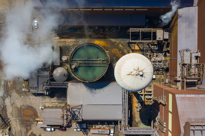 Bird eye view photography of a modern steel producing facility on the shores of Lake Michigan in Indiana