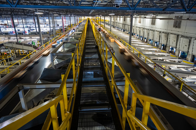 Highly automated sorting line and equipment inside a shipping company's distribution facility