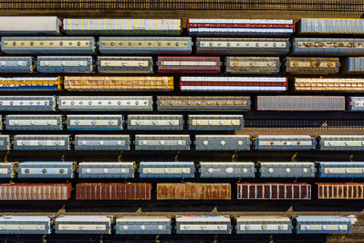 Aerial photographer interpretation of rail cars seen from above at a staging railyard station in Aurora, IL