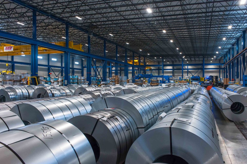 Large stainless coils inside a stainless steel and aluminum processing facility