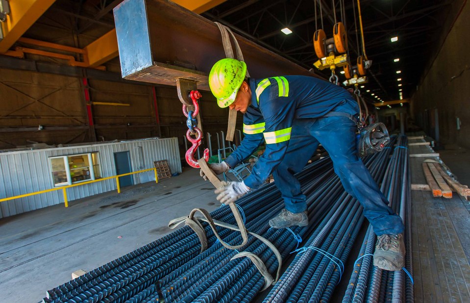 Loading of structural steel elements onto a semi trailer, ready to be shipped to a construction site 