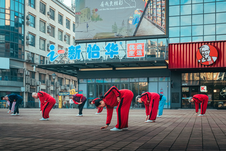 A group of senior citizens practicing Tai Chi in the early morning in Changzhou, China.