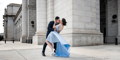 A newly engaged couple pose for a picture in Washington DC