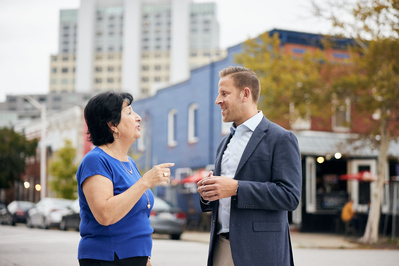 Mark Edelson, Maryland state Delegate candidate posing with a constituent during a political photo shoot.