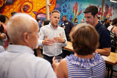 Maryland State Delegate candidate Mark Edelson speaks to a crowd during a political fundraising event in Baltimore City Maryland.
