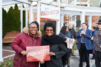 Photograph of State Senator Mary Washington posing with supporter at campaign event in Baltimore, Maryland