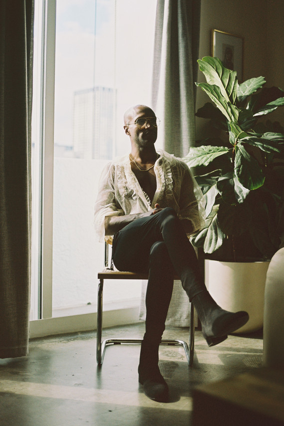 Man wearing woman's clothes with Jame Lorenzo shot in 35mm film by gara in los angeles