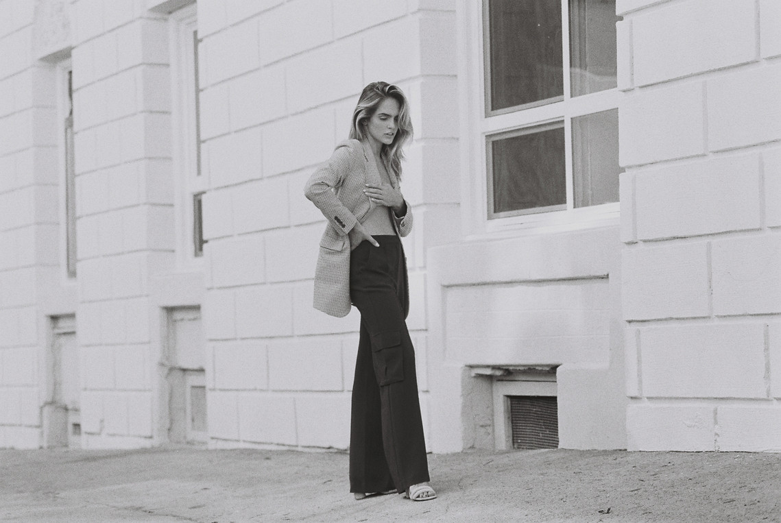 Suits Editorial with Kassidy Ramirez shot in 35mm film by gara in Los Angeles