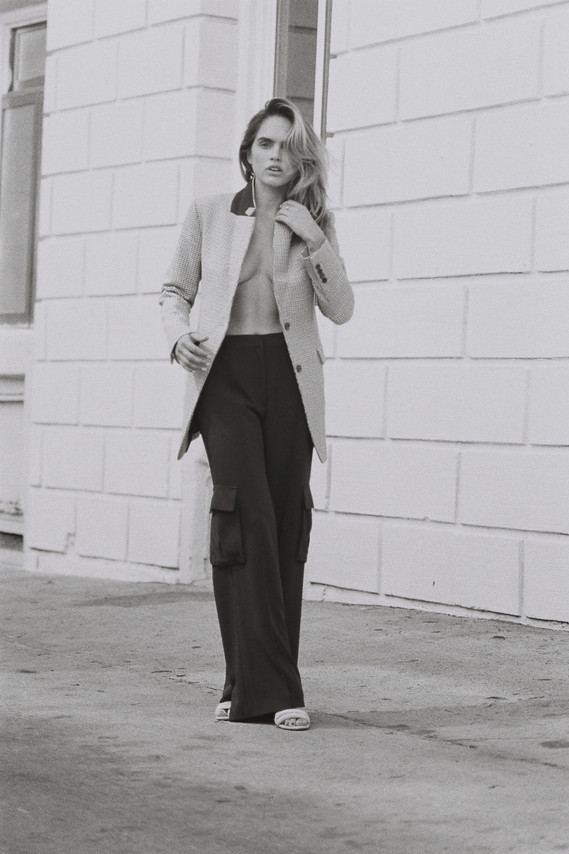 Suits Editorial with Kassidy Ramirez shot in 35mm film by gara in Los Angeles