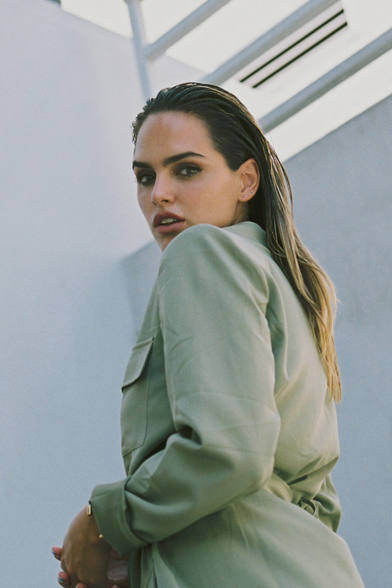 Suits Editorial with Kassidy Ramirez shot in 35mm film by gara in Los Angeles