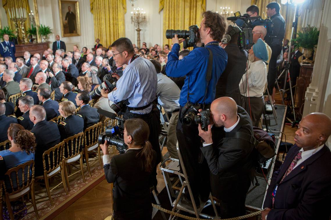 Photographer Thomas Simonetti photographing an event at the White House in 2012.