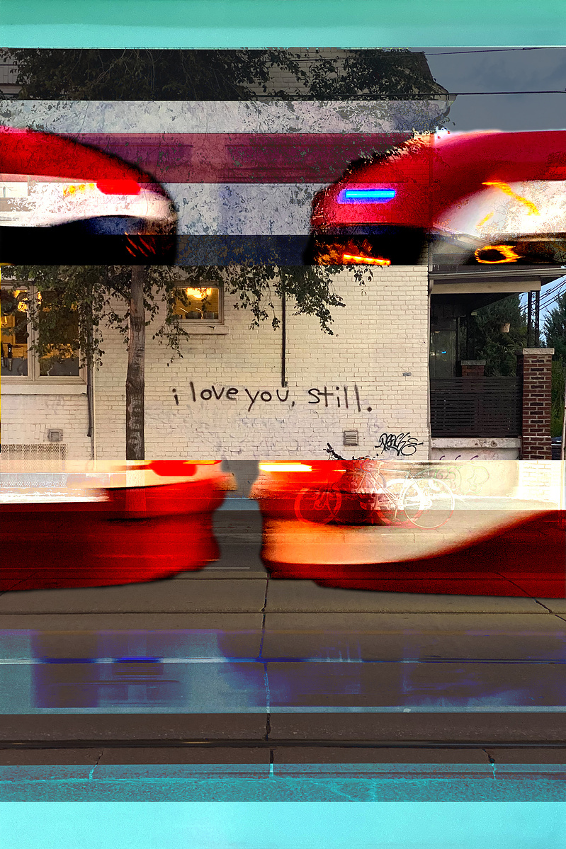 Text that reads "I love you, still." sprayed on an off white brick wall. A composite of the streetcar passing by overlays the image surrounding the text. By Leilah Dhoré in Toronto, Ontario