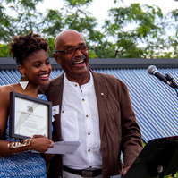 Photo of scholarship winner Aijia Waithe and Archie Alleyne for the Archie Alleyne Scholarship Fund Reception hosted by Nia Centre for the arts at the AccessPoint on Danforth (APOD) in Toronto, Canada