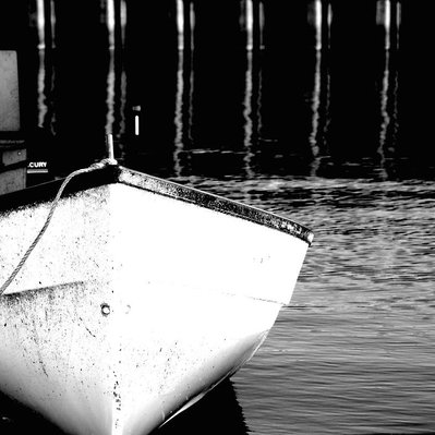 A single fishing boat located in Gimli harbour, Manitoba.
