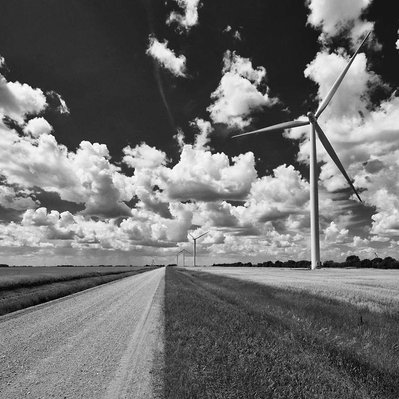 Wind generators found along a prairie gravel country road in Manitoba