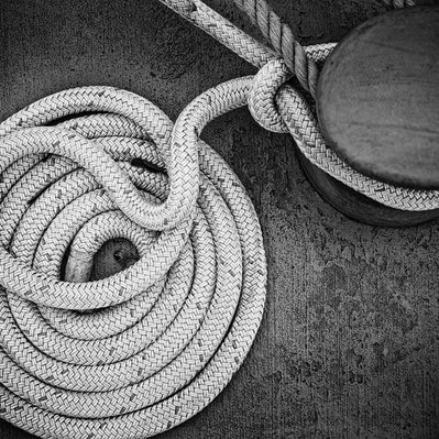 A rope and cleat for a fishing boat in Gimli harbour, Manitoba