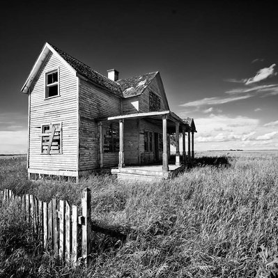 An abandoned homestead located in the prairie region of Manitoba Canada.