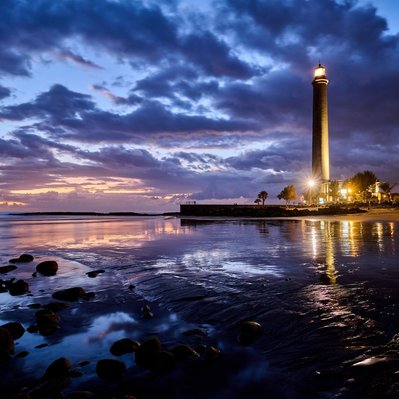 Gran Canaria landscape photograph featuring the Mospalomos lighthouse at sunset.