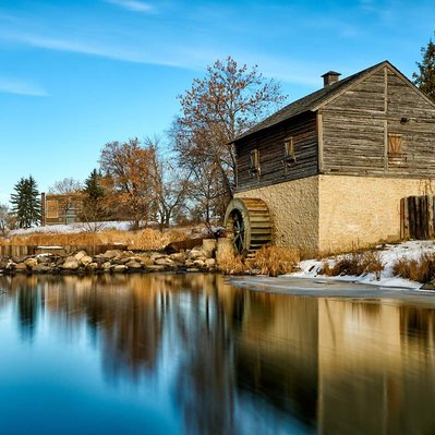 The Grant's old mill along the slowly freezing Sturgeon creek in Winnipeg Manitoba.