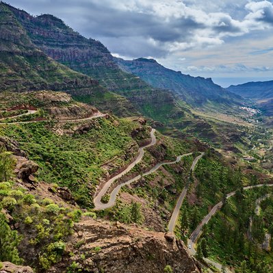 Gran Canaria landscape photograph featuring winding roads and s turns through the mountains.