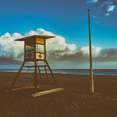 Gran Canaria landscape photograph featuring a lifeguard station on the beach.
