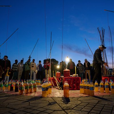 A photograph featuring a bottle game in the Marrakesh Marketplace.