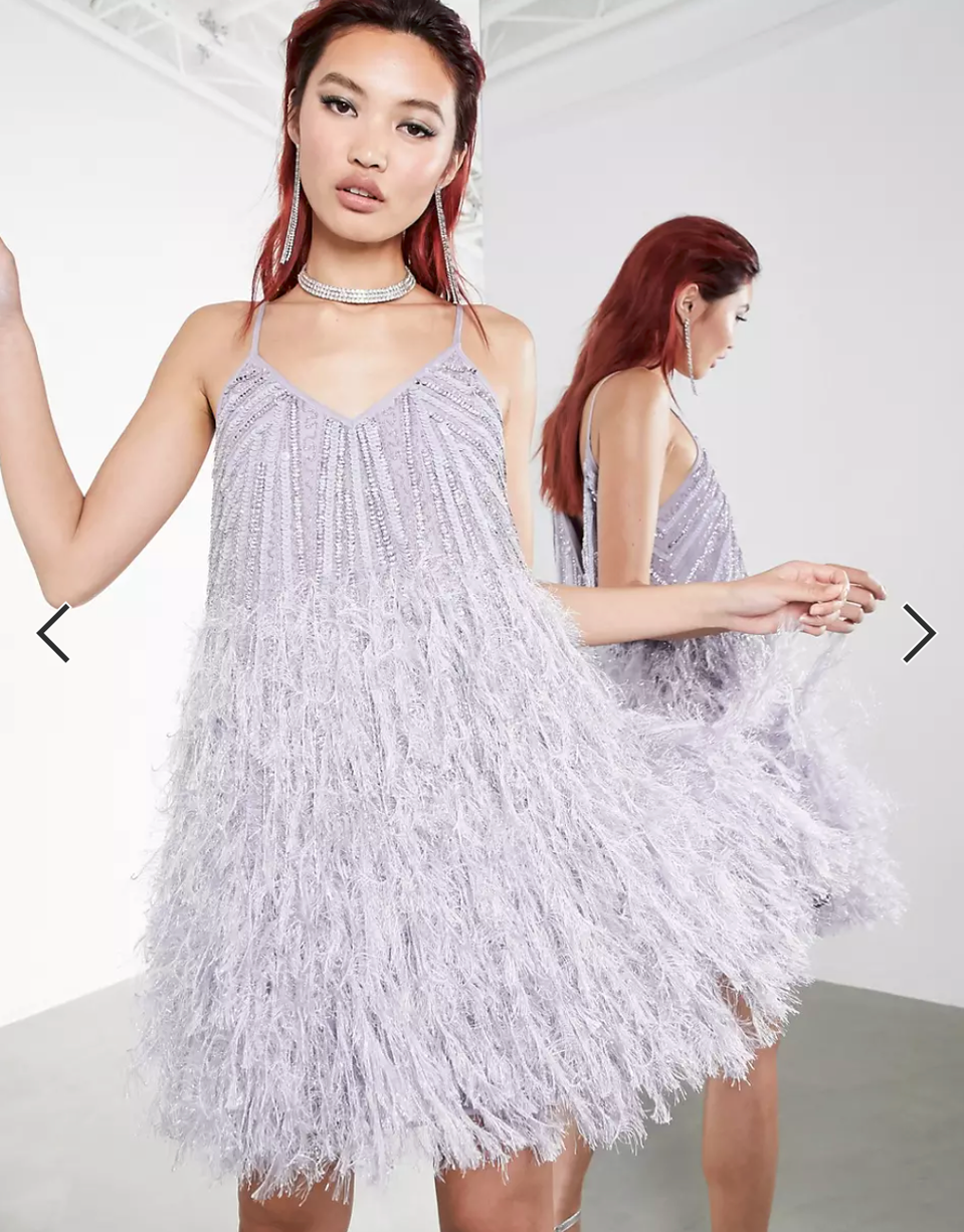 woman in purple frilly dress