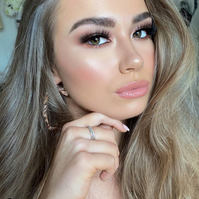 lady with hand on chin makeup