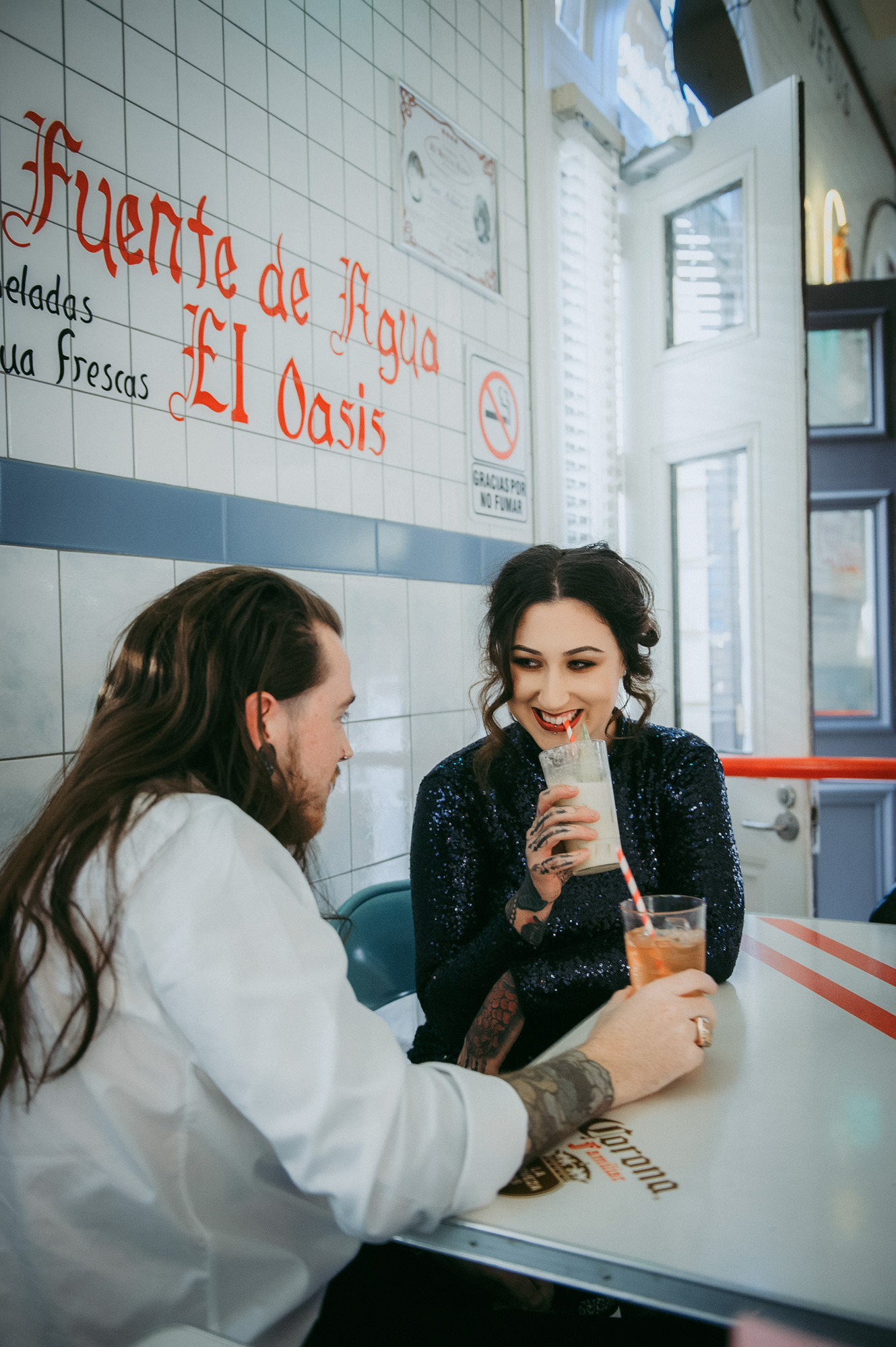 couple sharing a drink in a restaurant 