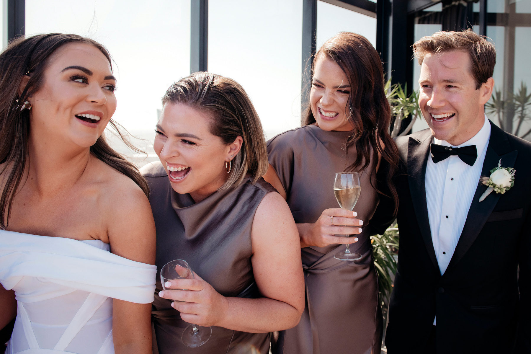 4 people laughing 