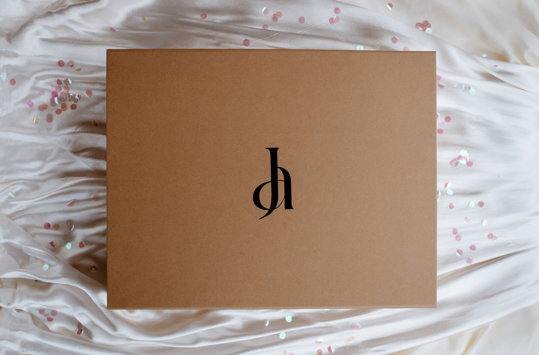 cardboard box with JA logo on it