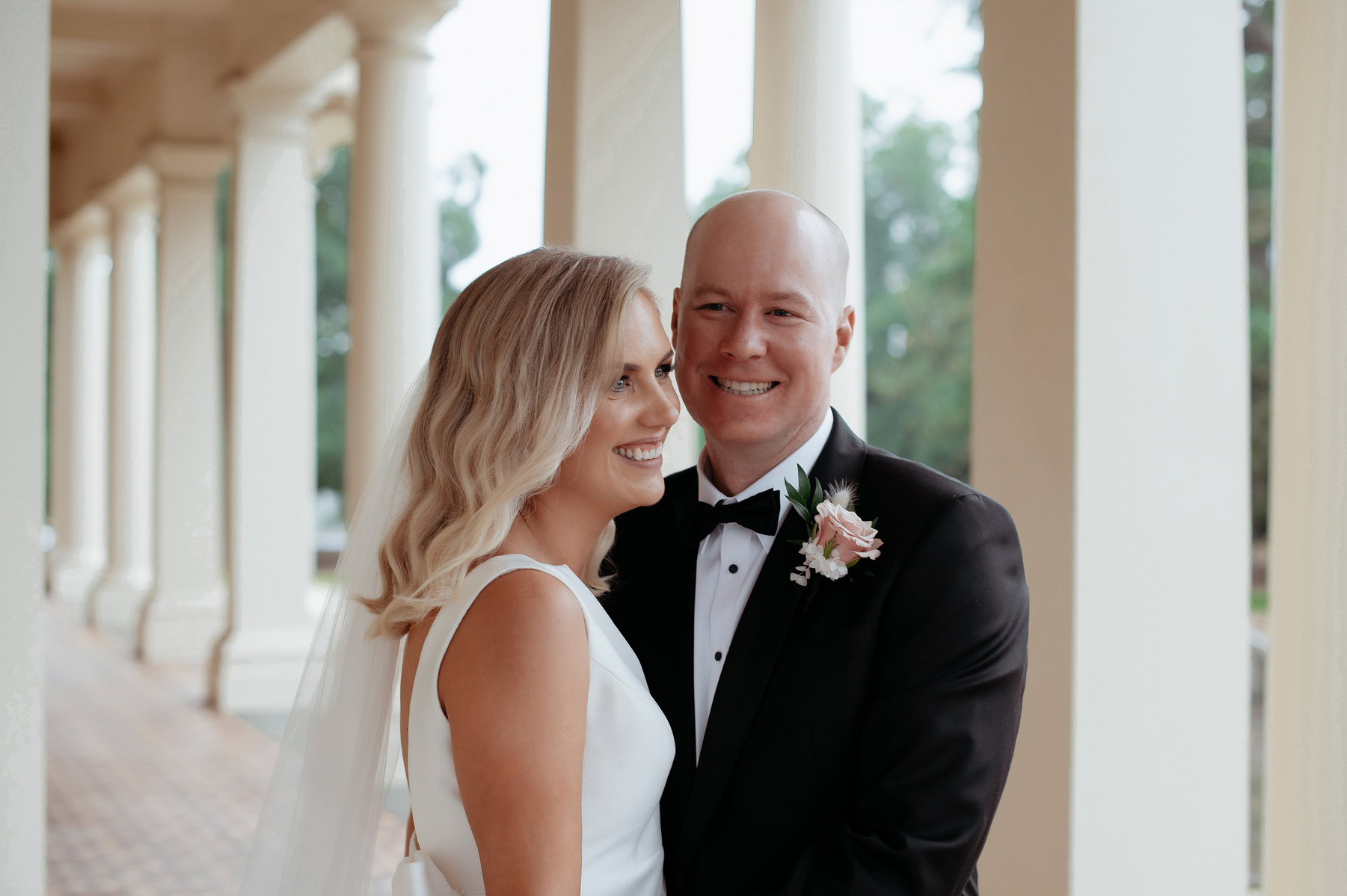 man and woman smiling 