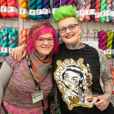 Colorful photo of 2 female attendees at the Woolinn event in Dublin - live corporate social event photography 