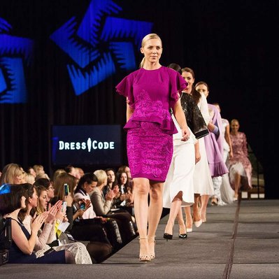 Model in pink dress walking the catwalk at a fashion event in Dublin taken by a professional event photographer