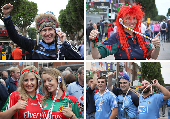 Colourful street photos of Dublin and Mayo supporters attending the Lidl LGFA All-Ireland Final in Croke Park Dublin wearing Lidl promoted headsets. Corporate event photographer Dublin