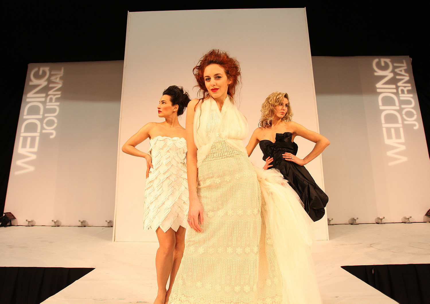 Live Wedding show event. Professional models photographed on catwalk wearing wedding dresses. Live event photographer Dublin