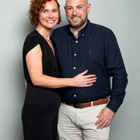 Corporate social event photo of guests against a grey studio background. Photo printed onsite at the event www.eventimage.ie