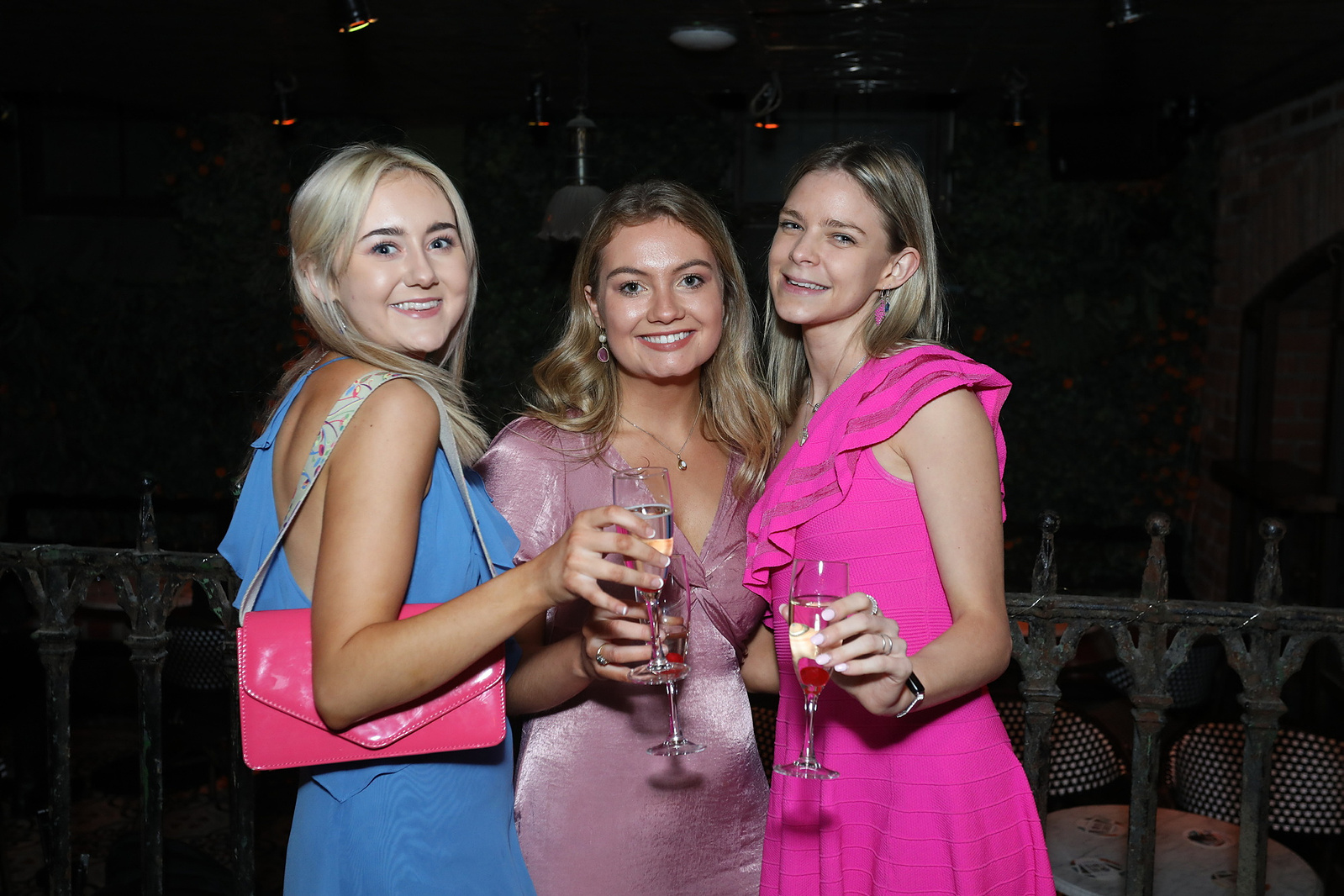 Live event photo of 3 young females celebrating at a social party in Dublin Ireland. Social Event Photographers Dublin