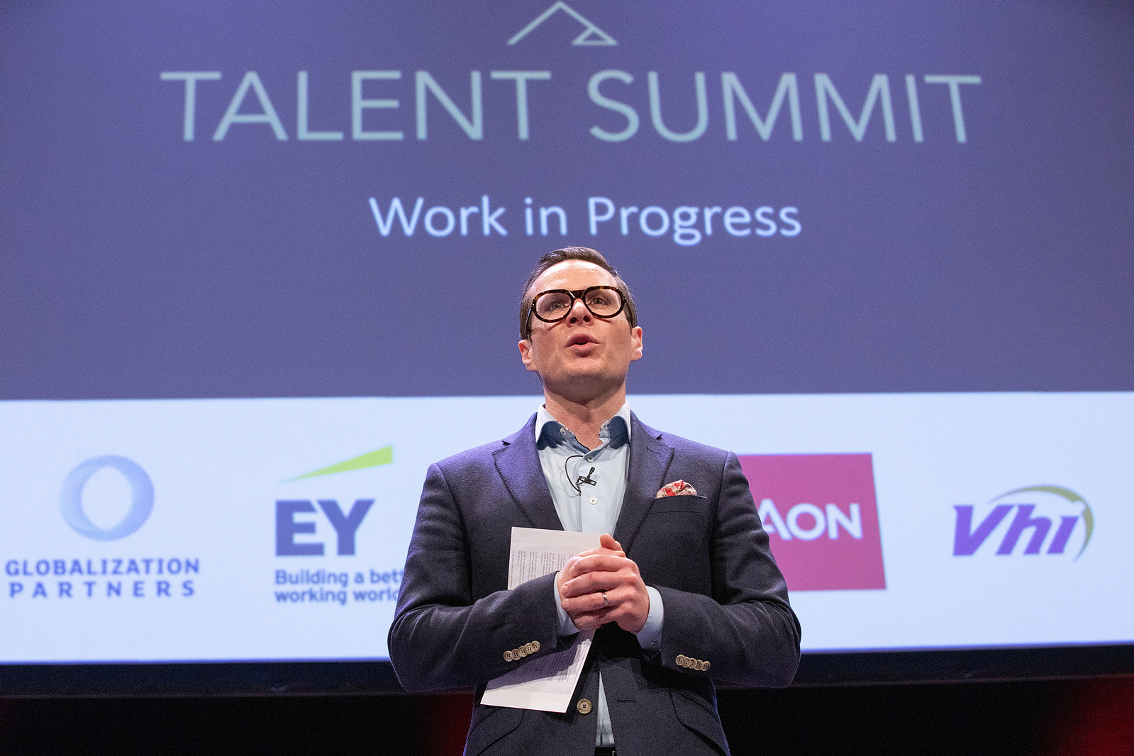Founding Director and CCO of Sigmar Recruitment Robert Mac Giolla Phádraig speaking onstage at  the Talent Summit  live event at Convention Centre Dublin. Professional Corporate Photographer, Bryan Brophy