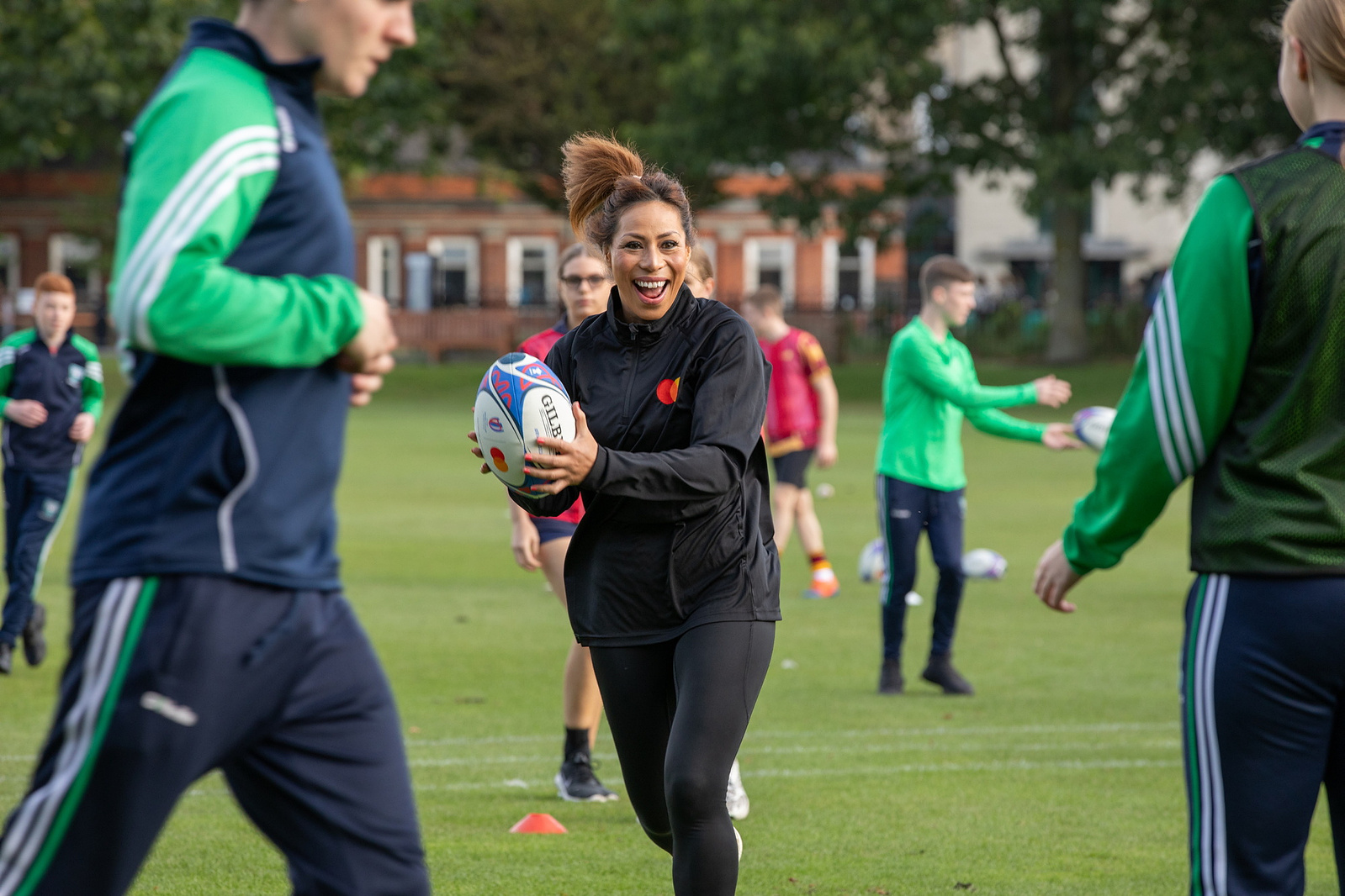 Sene Naoupu pictured running with a ball at the Mastercard Future of Rugby report photocall at Trinity College, Dublin. EVENT Press & PR Photographer, Dublin www.eentimage.ie 