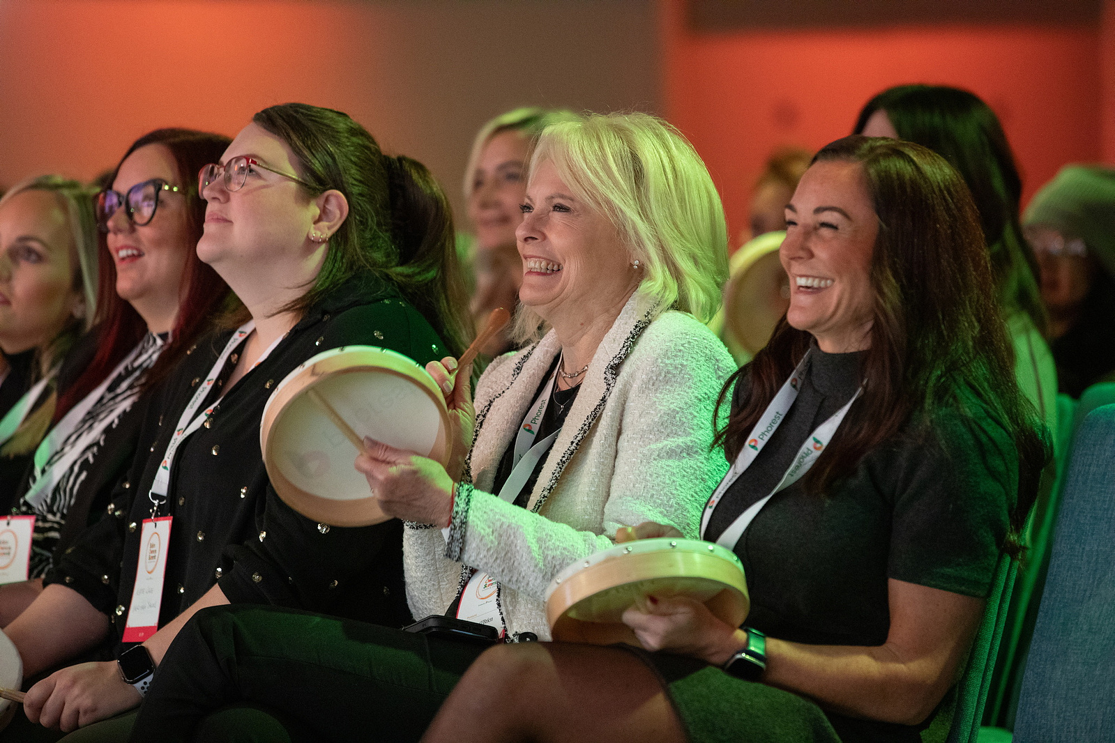 Vibrant social photo of delegate participation in the audience at the Phorest Salon Owners Summit 2025 at the Dublin Royal Convention Centre. Live corporate event photographer www.eventimage.ie