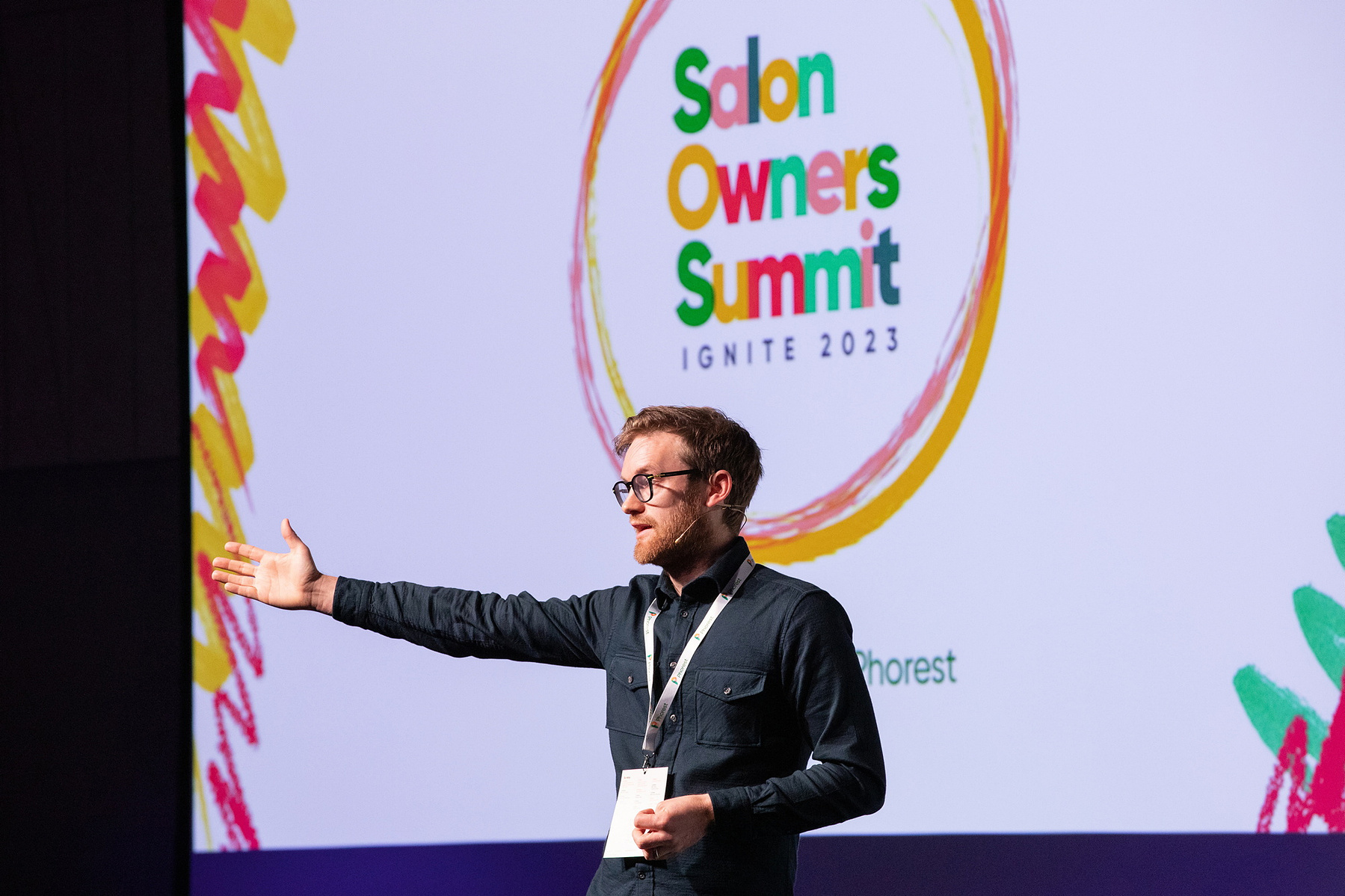 Event photographer Dubin, speaker on stage at Salon Owners Summit 2023 in Dublin Royal Convention Centre