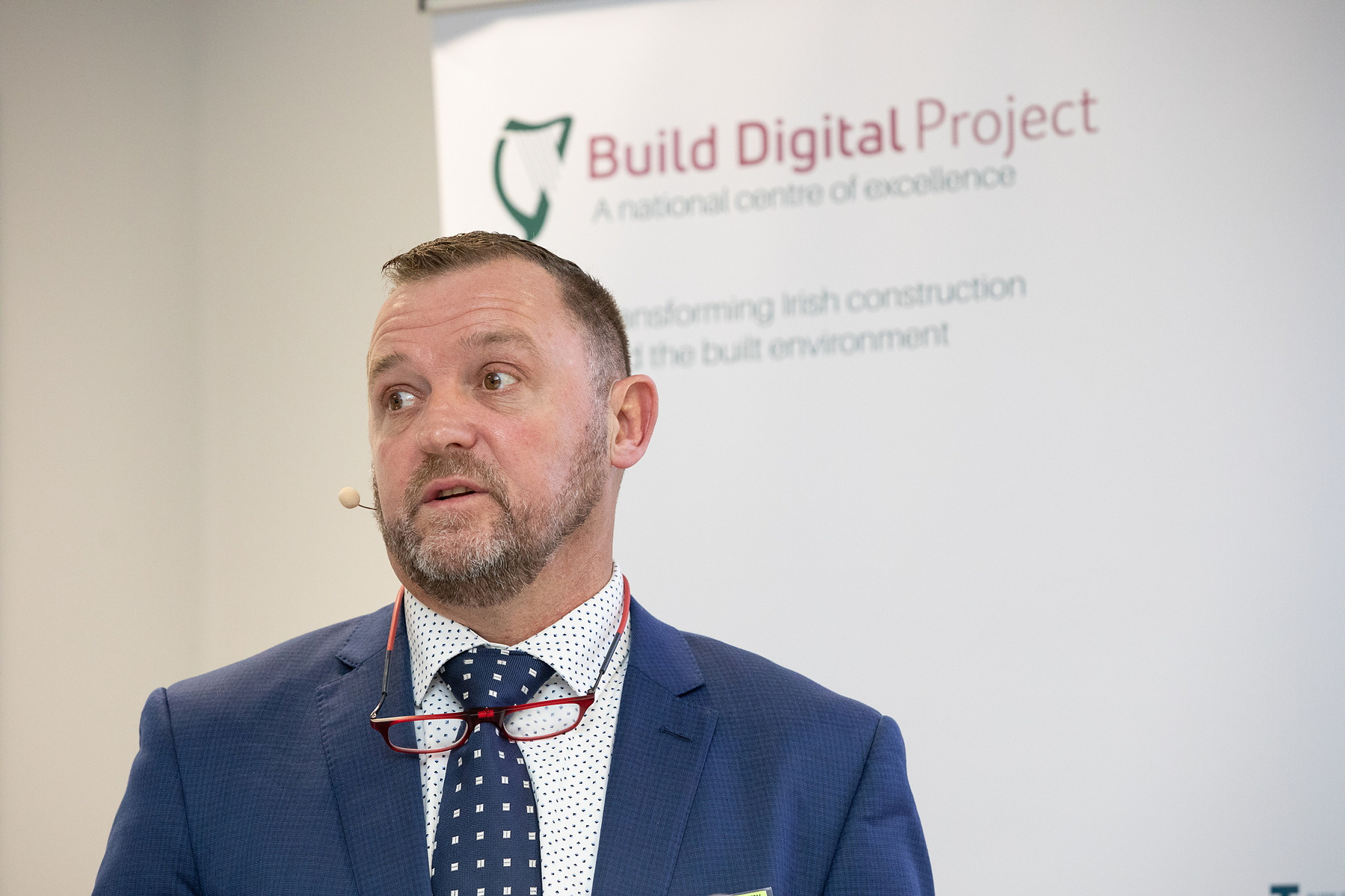 Male speaker addressing audience at CWMF BIM Mandate Conference 2023. Conference & event photographer Dublin www.eventimage.ie