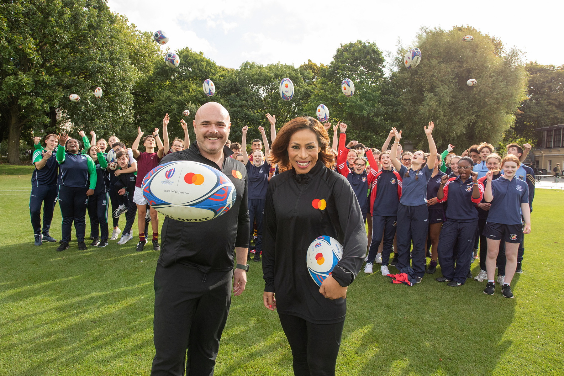 Sene Naoupu pictured at a training session for local children at Trinity College, Dublin. Mastercard Future of Rugby Report. Corporate event photographer www.1image.ie